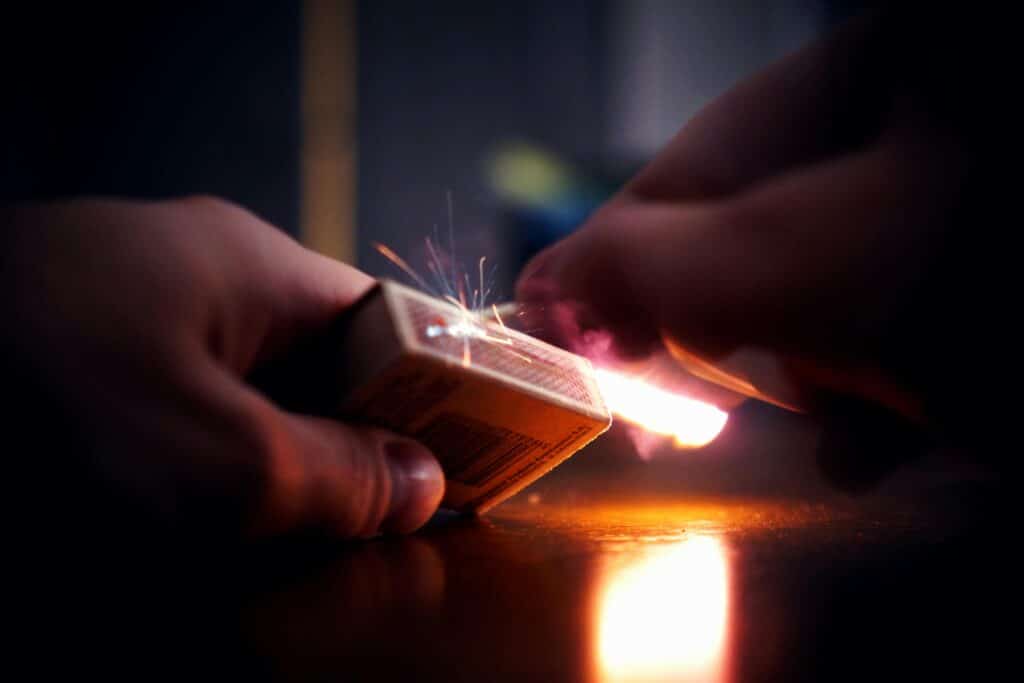 Lighting a match a symbol for crashing out