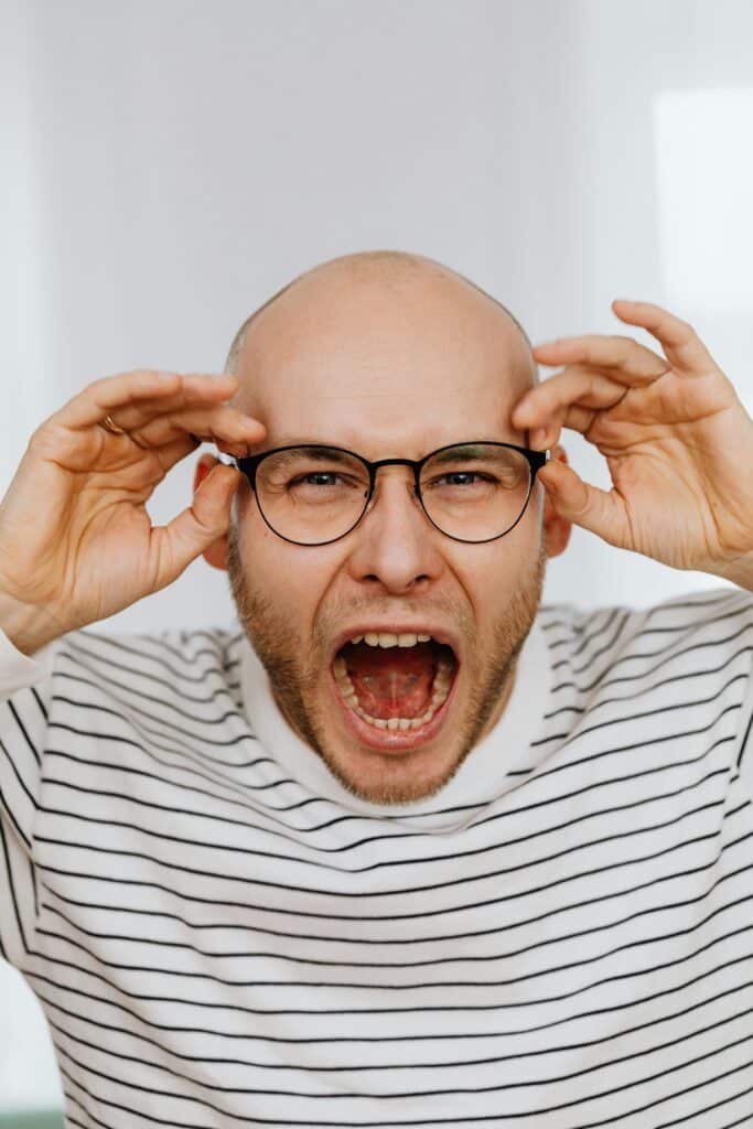 A man screaming